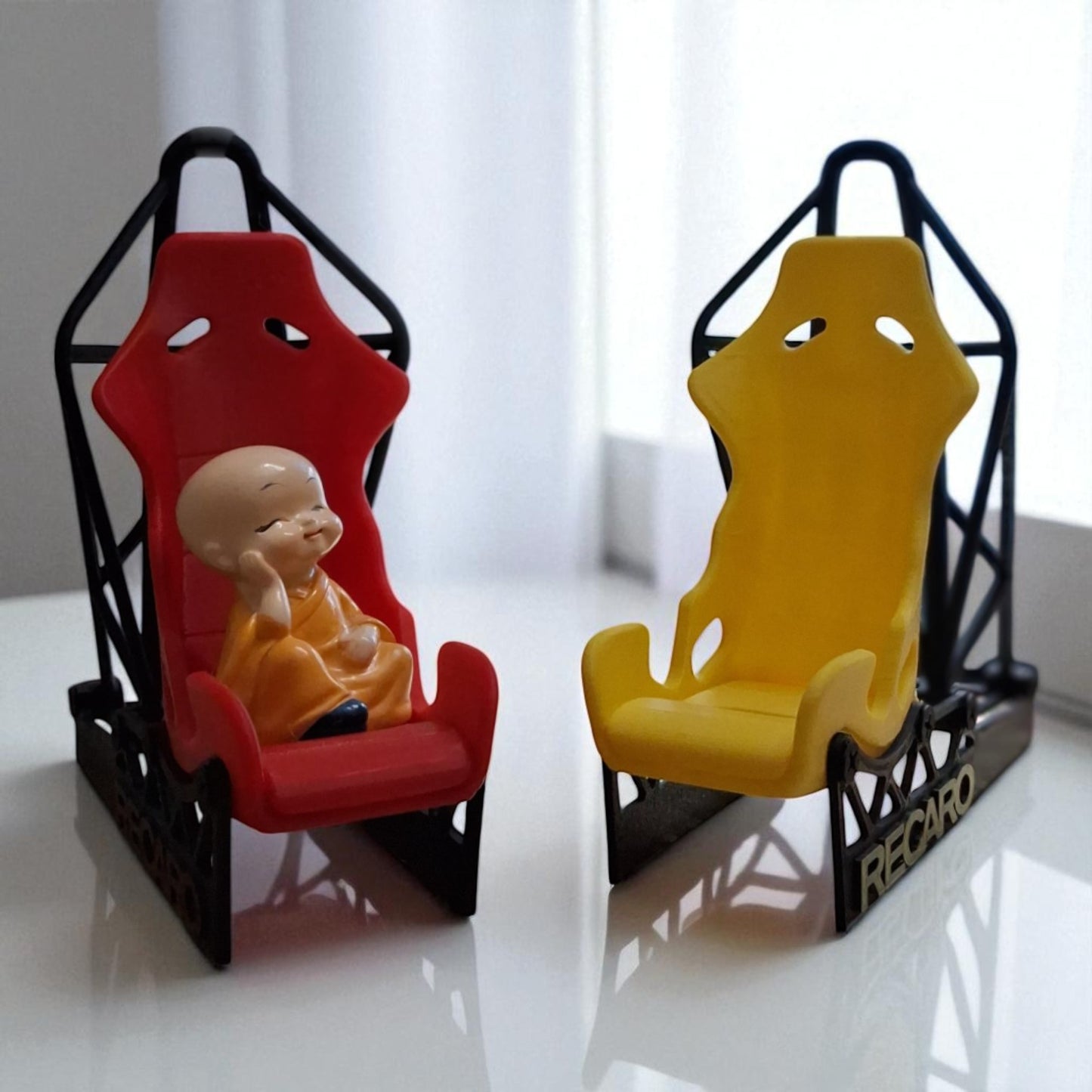 Racing Car Seat 3D Phone Stand – For Car & Speed Lovers